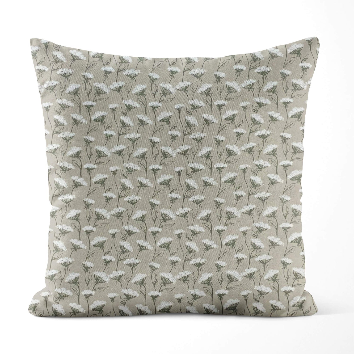 Decorative pillow with floral pattern on a beige background