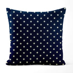 Navy blue pillow with white star pattern on a white background