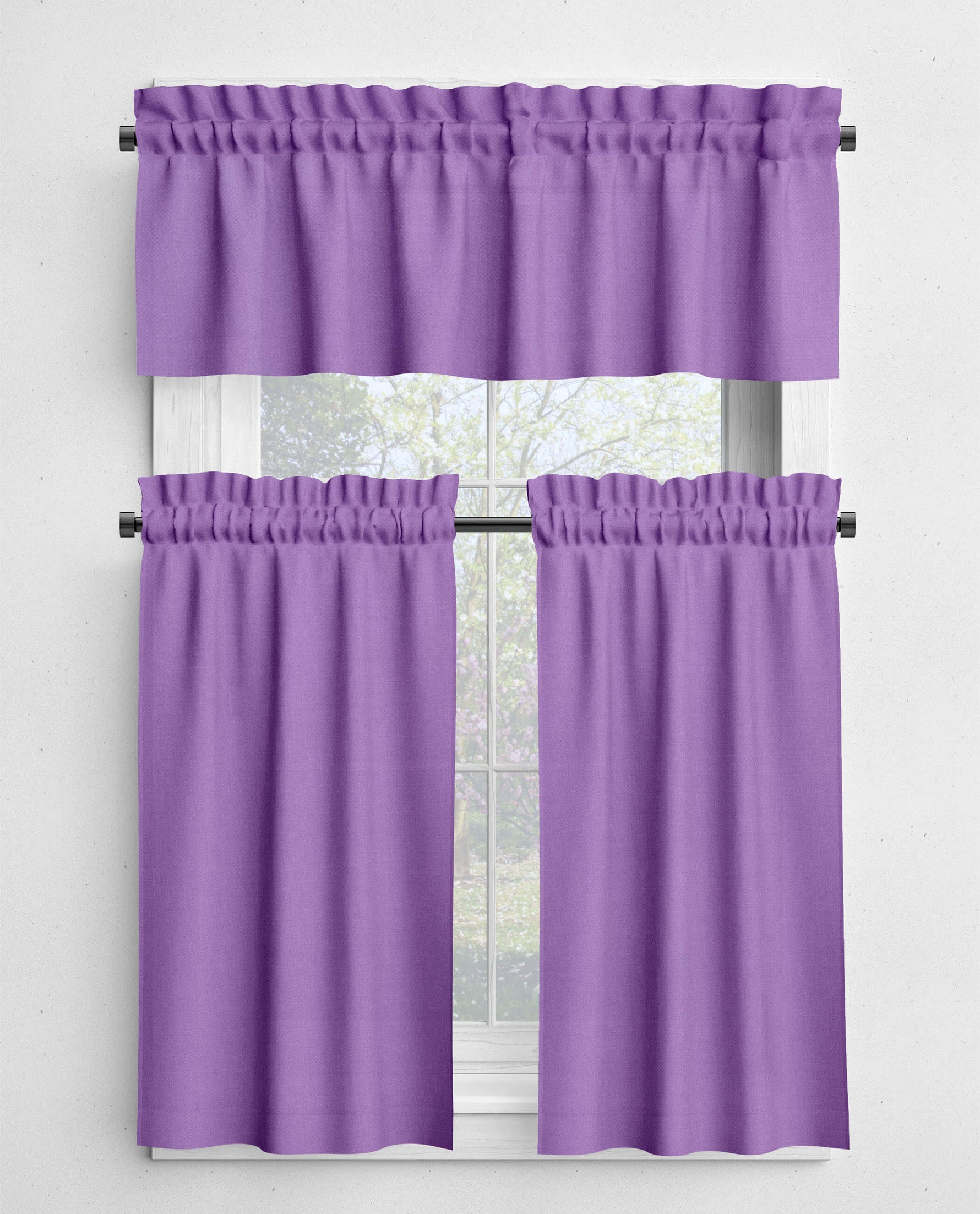Purple window curtain set with a valance and two tiers in front of a window.