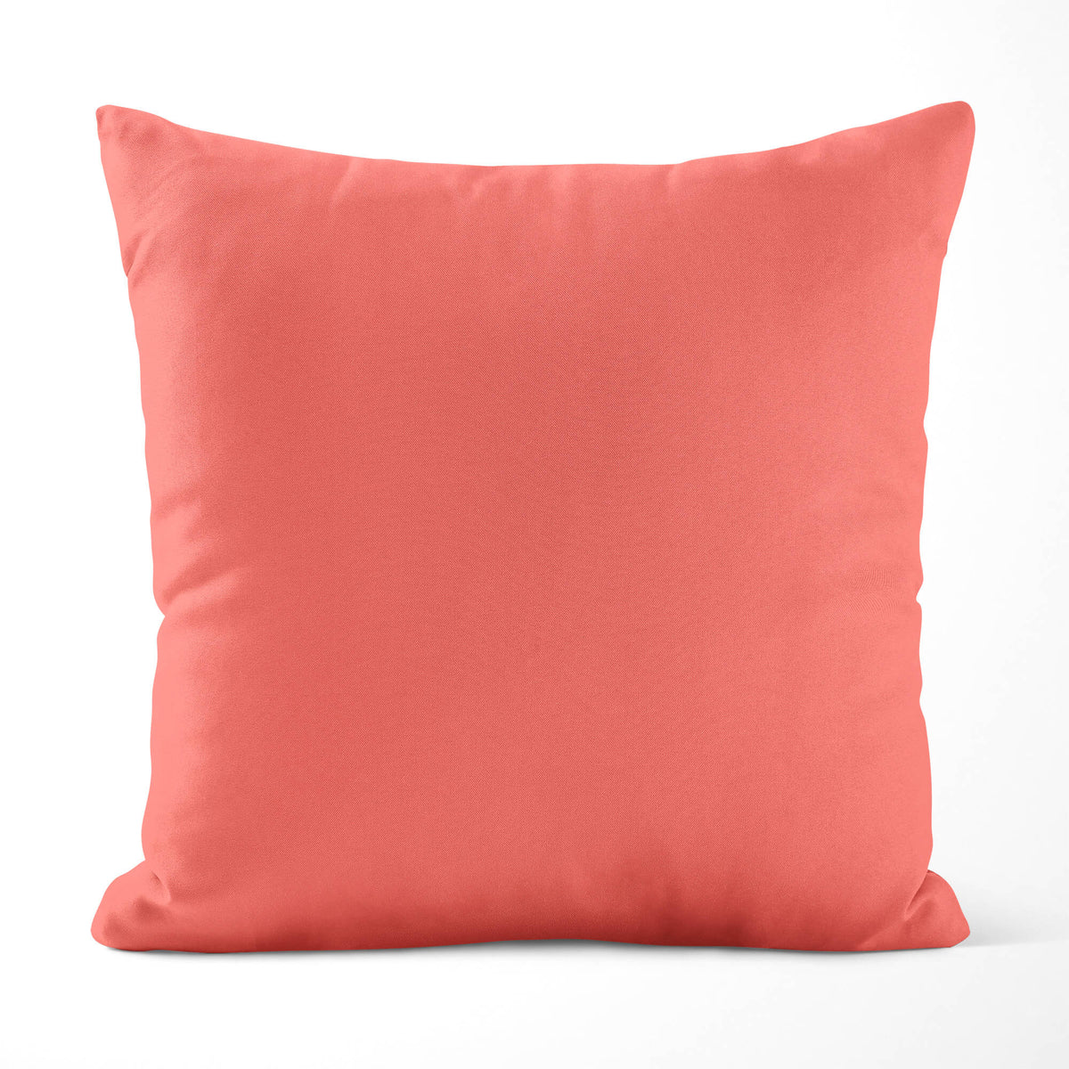 Salmon-colored pillow on a white background
