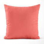 Salmon-colored pillow on a white background