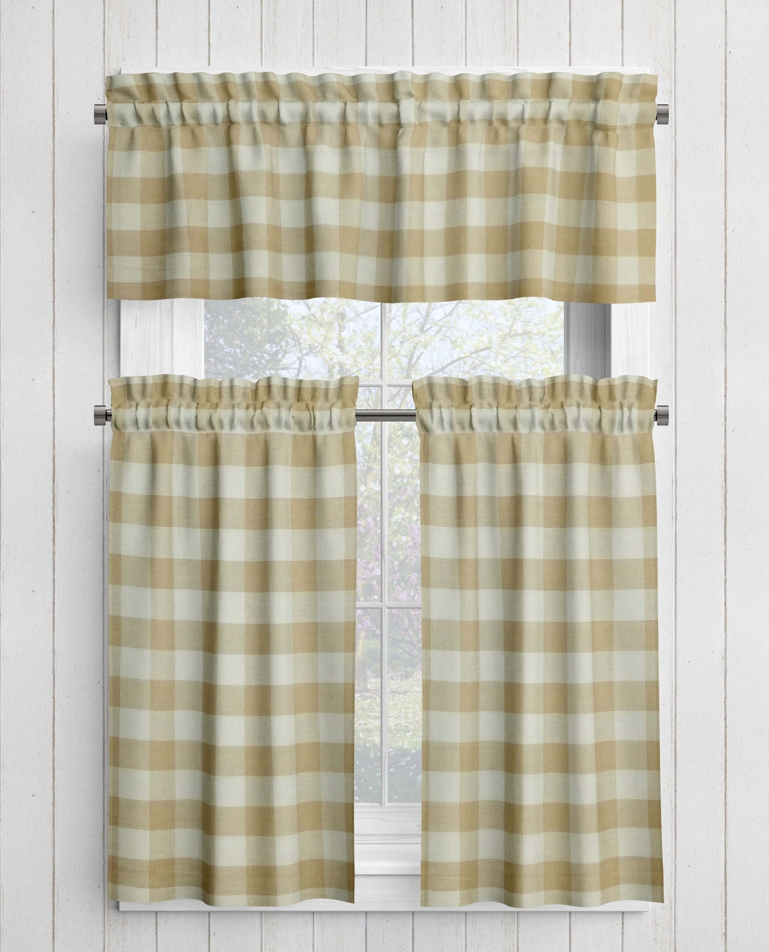 Checkered curtains on a window with a white wooden background