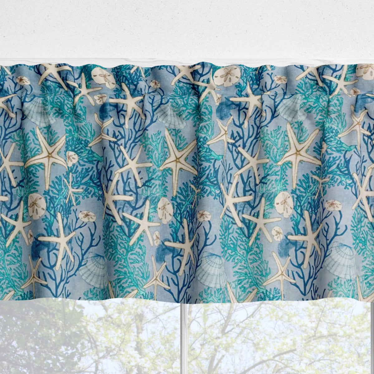 Curtain with starfish and coral pattern on a blue background