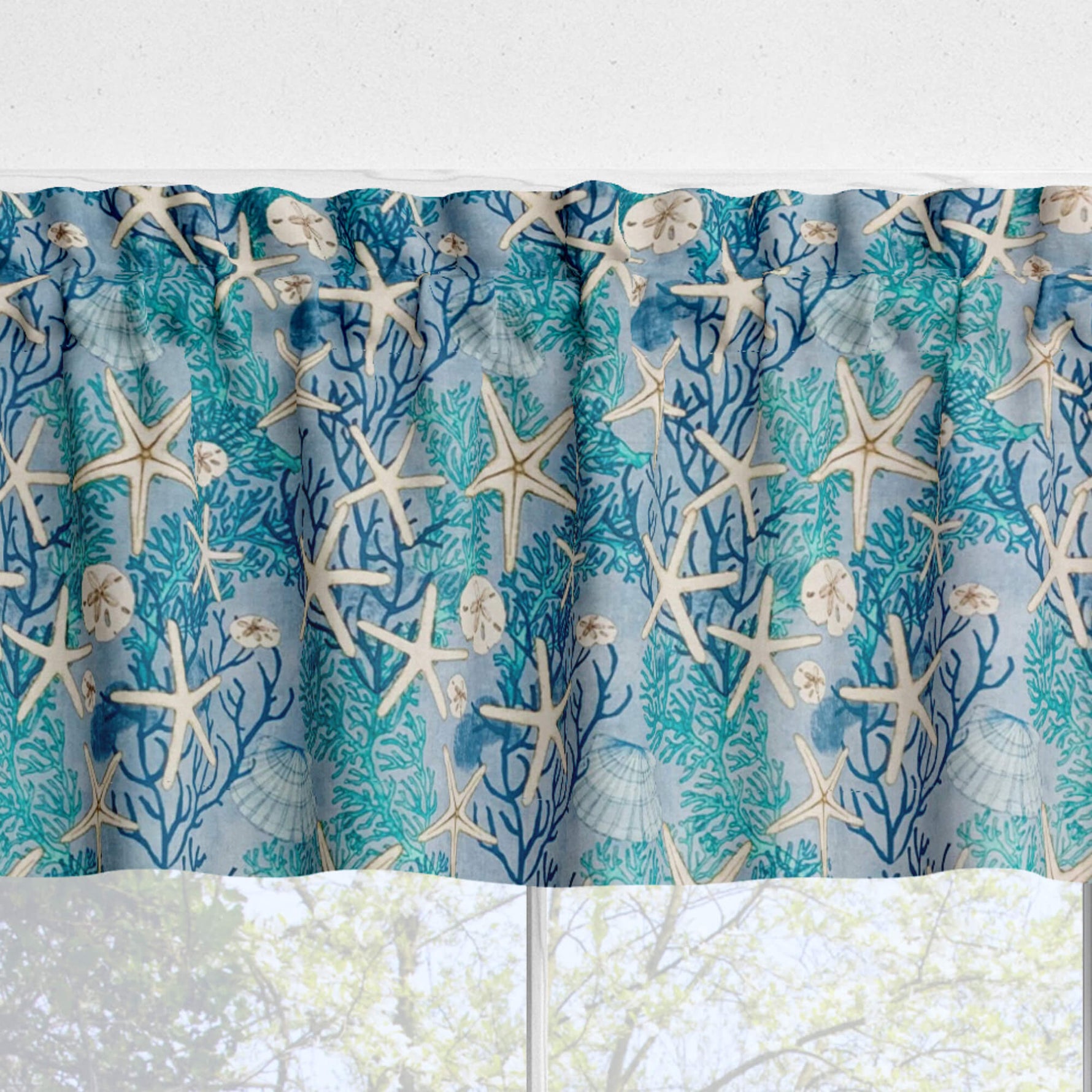 Curtain with starfish and coral pattern on a blue background